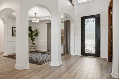 Welcome to this beautifully updated 3,628 sq ft, 4-bedroom home on Trophy Club of Dallas in Texas - for sale on GolfHomes.com, golf home, golf lot