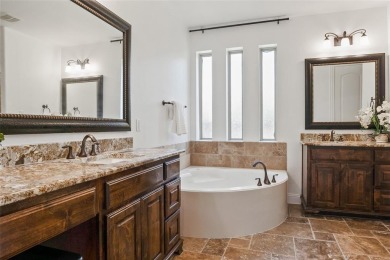 Welcome to this beautifully updated 3,628 sq ft, 4-bedroom home on Trophy Club of Dallas in Texas - for sale on GolfHomes.com, golf home, golf lot