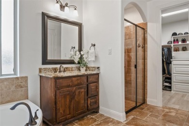 Welcome to this beautifully updated 3,628 sq ft, 4-bedroom home on Trophy Club of Dallas in Texas - for sale on GolfHomes.com, golf home, golf lot