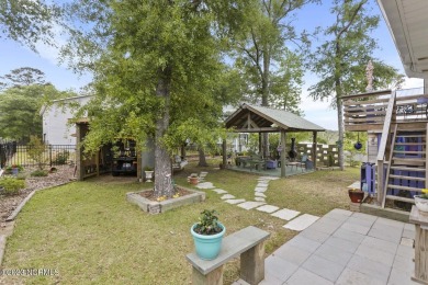 Are you ready for the coastal lifestyle? This impeccably on Founders Club At St. James Plantation in North Carolina - for sale on GolfHomes.com, golf home, golf lot