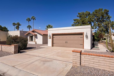This beautiful home is ideally situated on the Mesa Del Sol Golf on Mesa Del Sol Golf Club in Arizona - for sale on GolfHomes.com, golf home, golf lot