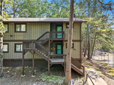 Vacation living at a price you'll love! This lower-level condo on The Highlands Course at Lake Arrowhead in Georgia - for sale on GolfHomes.com, golf home, golf lot