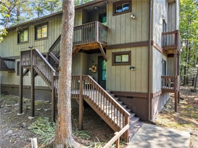 Vacation living at a price you'll love! This lower-level condo on The Highlands Course at Lake Arrowhead in Georgia - for sale on GolfHomes.com, golf home, golf lot