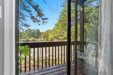 Vacation living at a price you'll love! This lower-level condo on The Highlands Course at Lake Arrowhead in Georgia - for sale on GolfHomes.com, golf home, golf lot
