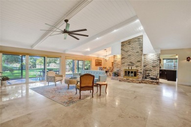 You will fall in love w/ this updated and gorgeous SFH!  3 BR 2 on Woodmont Country Club in Florida - for sale on GolfHomes.com, golf home, golf lot