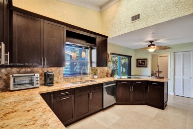 You will fall in love w/ this updated and gorgeous SFH!  3 BR 2 on Woodmont Country Club in Florida - for sale on GolfHomes.com, golf home, golf lot