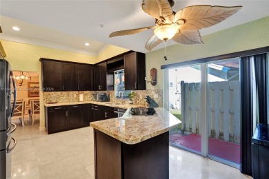 You will fall in love w/ this updated and gorgeous SFH!  3 BR 2 on Woodmont Country Club in Florida - for sale on GolfHomes.com, golf home, golf lot