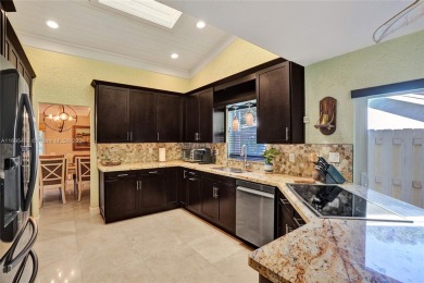 You will fall in love w/ this updated and gorgeous SFH!  3 BR 2 on Woodmont Country Club in Florida - for sale on GolfHomes.com, golf home, golf lot