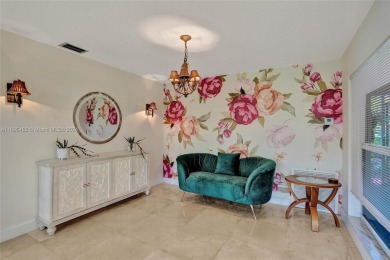 You will fall in love w/ this updated and gorgeous SFH!  3 BR 2 on Woodmont Country Club in Florida - for sale on GolfHomes.com, golf home, golf lot