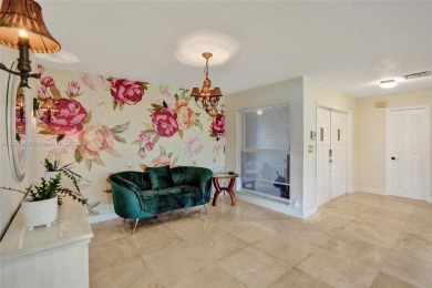 You will fall in love w/ this updated and gorgeous SFH!  3 BR 2 on Woodmont Country Club in Florida - for sale on GolfHomes.com, golf home, golf lot