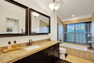 You will fall in love w/ this updated and gorgeous SFH!  3 BR 2 on Woodmont Country Club in Florida - for sale on GolfHomes.com, golf home, golf lot