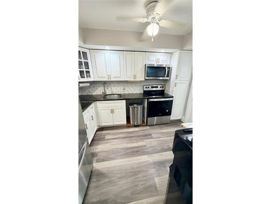 Stunning Corner Condo in the Heart of Pompano Beach! Step into on Palm-Aire Country Club and Resort - Palms in Florida - for sale on GolfHomes.com, golf home, golf lot