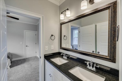 Experience elegant living in this beautifully designed 5-bedroom on Bartram Trail Golf Club in Georgia - for sale on GolfHomes.com, golf home, golf lot