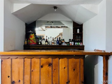 One-of-a-kind home on a spacious lot in a prime location! on Hannibal Country Club in Missouri - for sale on GolfHomes.com, golf home, golf lot