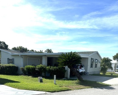 Welcome to Your Spacious Triple-Wide Retreat with Pond Views! on Schalamar Creek Golf and Country Club in Florida - for sale on GolfHomes.com, golf home, golf lot