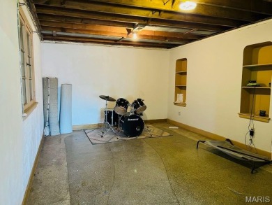 One-of-a-kind home on a spacious lot in a prime location! on Hannibal Country Club in Missouri - for sale on GolfHomes.com, golf home, golf lot