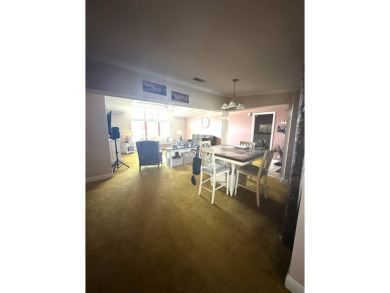 Welcome to Your Spacious Triple-Wide Retreat with Pond Views! on Schalamar Creek Golf and Country Club in Florida - for sale on GolfHomes.com, golf home, golf lot