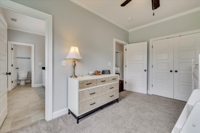 Experience elegant living in this beautifully designed 5-bedroom on Bartram Trail Golf Club in Georgia - for sale on GolfHomes.com, golf home, golf lot