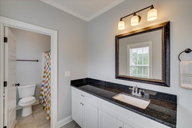 Experience elegant living in this beautifully designed 5-bedroom on Bartram Trail Golf Club in Georgia - for sale on GolfHomes.com, golf home, golf lot