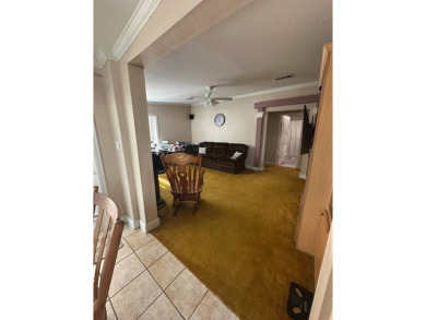 Welcome to Your Spacious Triple-Wide Retreat with Pond Views! on Schalamar Creek Golf and Country Club in Florida - for sale on GolfHomes.com, golf home, golf lot