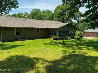 Impeccably Maintained Ranch on a  1/2 -Acre Lot and located on Baxter Country Club in Kansas - for sale on GolfHomes.com, golf home, golf lot