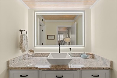 Stunning and furnished condo at The Oaks! Impeccably renovated on Sea Palms Golf and Tennis Resort in Georgia - for sale on GolfHomes.com, golf home, golf lot