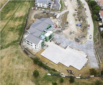 The Residences are luxury new construction golf villas nestled on TPC Four Seasons - Las Colinas Resort in Texas - for sale on GolfHomes.com, golf home, golf lot