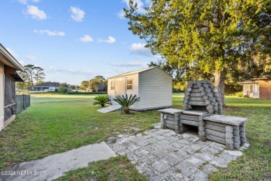 Welcome to this charming two-bedroom, one-bath home overlooking on Keystone Heights Golf and Country Club in Florida - for sale on GolfHomes.com, golf home, golf lot