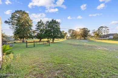 Welcome to this charming two-bedroom, one-bath home overlooking on Keystone Heights Golf and Country Club in Florida - for sale on GolfHomes.com, golf home, golf lot