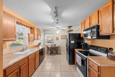 Charming 2 bedroom, 2 bath home with garage located on the 11th on Sandpiper Golf Club in Florida - for sale on GolfHomes.com, golf home, golf lot
