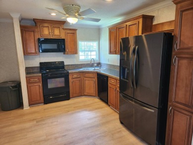Welcome Home, this 2 bedroom /2 bath in desirable Spanish lakes on Spanish Lakes Fairways in Florida - for sale on GolfHomes.com, golf home, golf lot