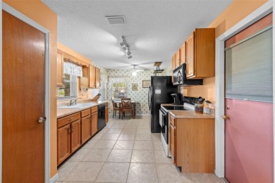 Charming 2 bedroom, 2 bath home with garage located on the 11th on Sandpiper Golf Club in Florida - for sale on GolfHomes.com, golf home, golf lot