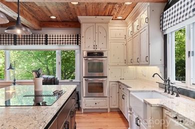 Check out this gorgeous, immaculately updated, and perfectly on Waynesville Country Club Inn in North Carolina - for sale on GolfHomes.com, golf home, golf lot