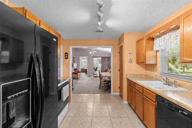 Charming 2 bedroom, 2 bath home with garage located on the 11th on Sandpiper Golf Club in Florida - for sale on GolfHomes.com, golf home, golf lot