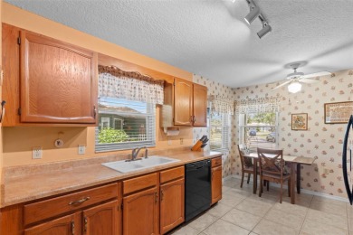 Charming 2 bedroom, 2 bath home with garage located on the 11th on Sandpiper Golf Club in Florida - for sale on GolfHomes.com, golf home, golf lot