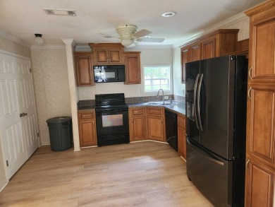Welcome Home, this 2 bedroom /2 bath in desirable Spanish lakes on Spanish Lakes Fairways in Florida - for sale on GolfHomes.com, golf home, golf lot