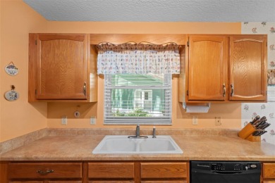 Charming 2 bedroom, 2 bath home with garage located on the 11th on Sandpiper Golf Club in Florida - for sale on GolfHomes.com, golf home, golf lot