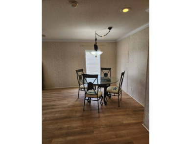 Welcome Home, this 2 bedroom /2 bath in desirable Spanish lakes on Spanish Lakes Fairways in Florida - for sale on GolfHomes.com, golf home, golf lot