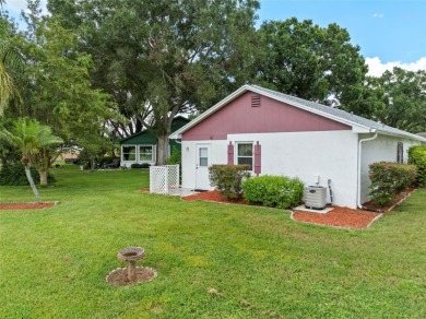 Charming 2 bedroom, 2 bath home with garage located on the 11th on Sandpiper Golf Club in Florida - for sale on GolfHomes.com, golf home, golf lot