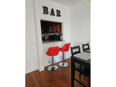 Cozy and comfy! That describes this Live Oak unit to a TEE! Wood on Pine Island Ridge Country Club in Florida - for sale on GolfHomes.com, golf home, golf lot