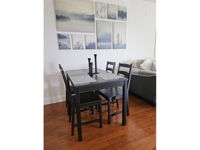 Cozy and comfy! That describes this Live Oak unit to a TEE! Wood on Pine Island Ridge Country Club in Florida - for sale on GolfHomes.com, golf home, golf lot