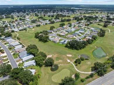 Charming 2 bedroom, 2 bath home with garage located on the 11th on Sandpiper Golf Club in Florida - for sale on GolfHomes.com, golf home, golf lot