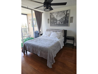 Cozy and comfy! That describes this Live Oak unit to a TEE! Wood on Pine Island Ridge Country Club in Florida - for sale on GolfHomes.com, golf home, golf lot