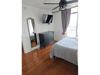 Cozy and comfy! That describes this Live Oak unit to a TEE! Wood on Pine Island Ridge Country Club in Florida - for sale on GolfHomes.com, golf home, golf lot