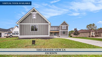 **Seller offering a concession at closing toward closing costs on Grande Golf Club in Michigan - for sale on GolfHomes.com, golf home, golf lot