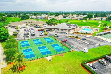 Charming 2 bedroom, 2 bath home with garage located on the 11th on Sandpiper Golf Club in Florida - for sale on GolfHomes.com, golf home, golf lot