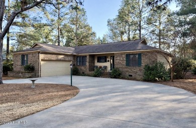 Welcome to this charming brick home nestled on a quiet street in on Pinehurst Resort and Country Club in North Carolina - for sale on GolfHomes.com, golf home, golf lot