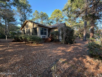 Welcome to this charming brick home nestled on a quiet street in on Pinehurst Resort and Country Club in North Carolina - for sale on GolfHomes.com, golf home, golf lot