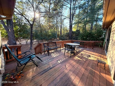 Welcome to this charming brick home nestled on a quiet street in on Pinehurst Resort and Country Club in North Carolina - for sale on GolfHomes.com, golf home, golf lot