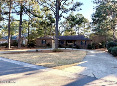 Welcome to this charming brick home nestled on a quiet street in on Pinehurst Resort and Country Club in North Carolina - for sale on GolfHomes.com, golf home, golf lot